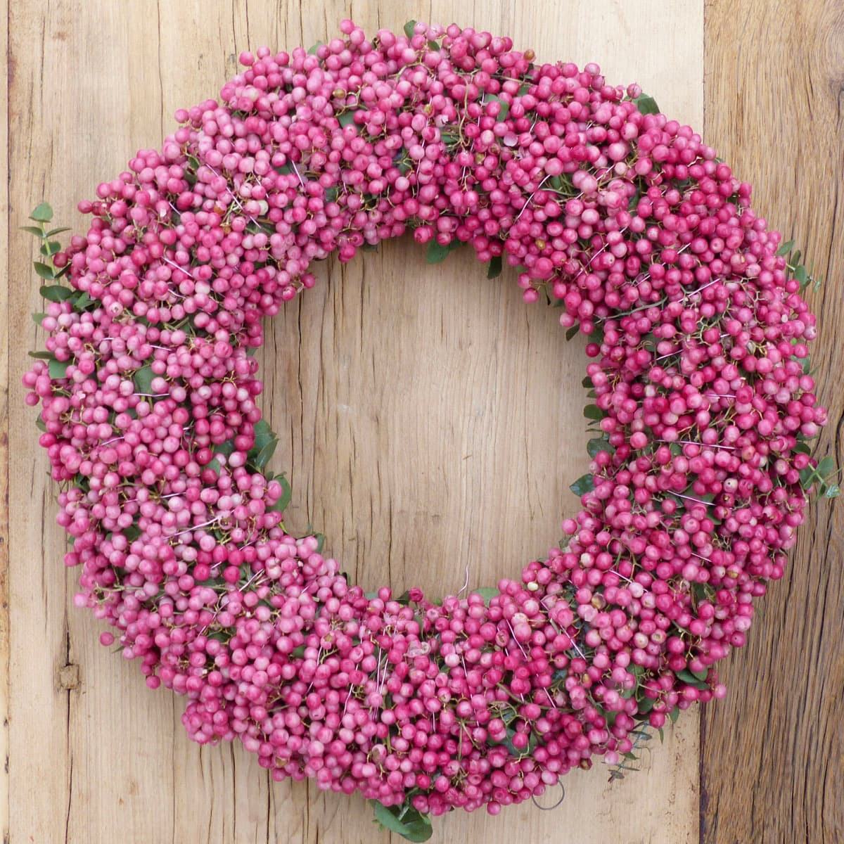 Kranz aus rosa Pfefferbeeren